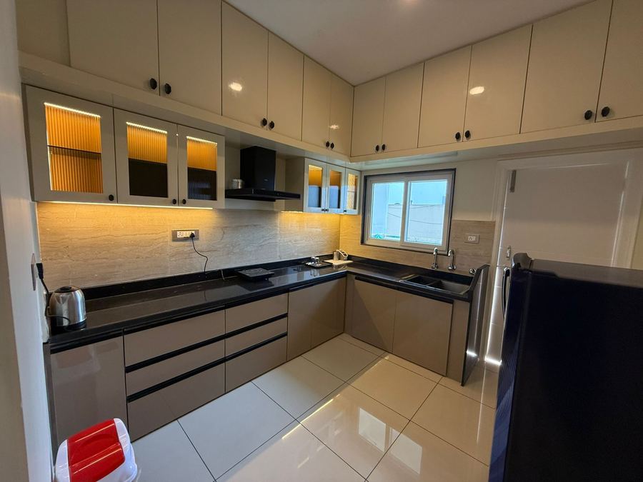 Fully equipped kitchen with modern cabinetry